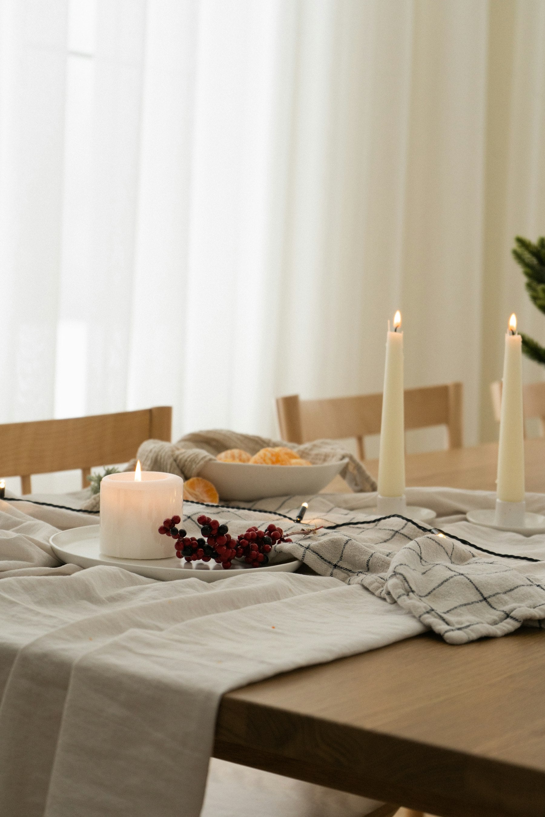 Editorial gift scene — wrapped linen, warm light
